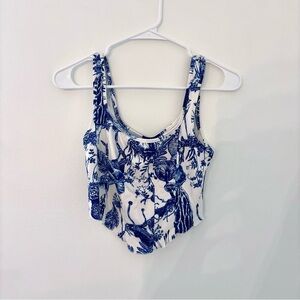 blue and white patterned cropped tank
